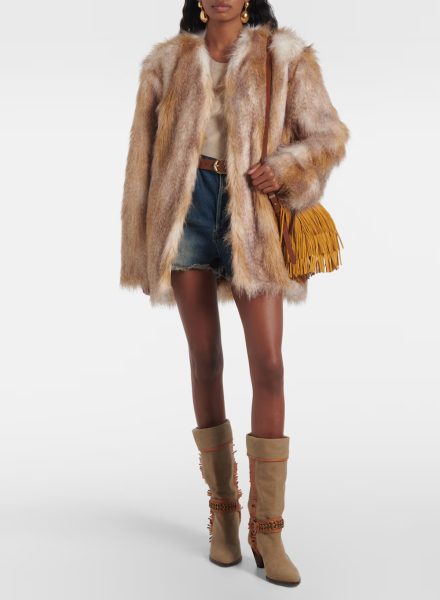 Il ritorno degli stivali: alti, texani o combat boot? La guida agli abbinamenti per ogni silhouette 8 idea look Isabel Marant Stivali texani Levon in canvas
